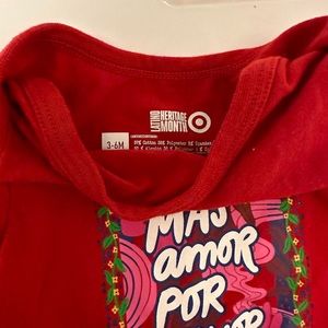 Baby girl bodysuit . Brand new